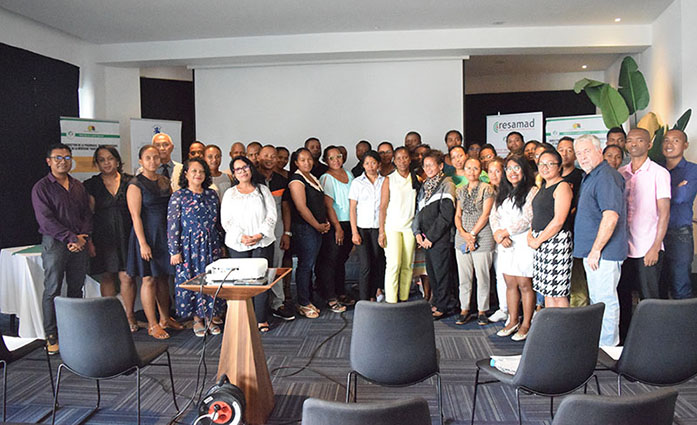 Participants of a workshop in a meeting room.